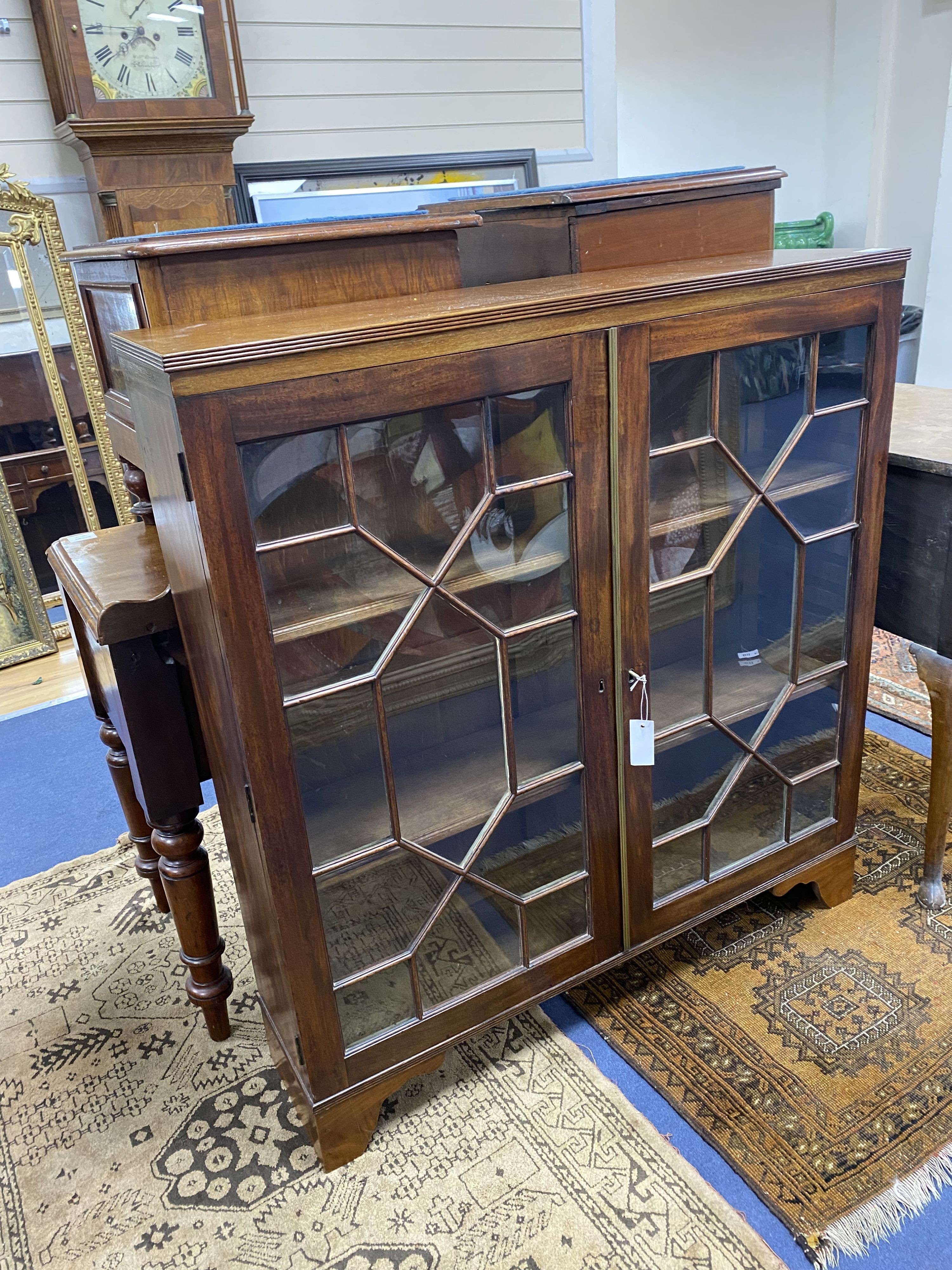 A George III style mahogany two door glazed cabinet, width 86cm, height 113cm